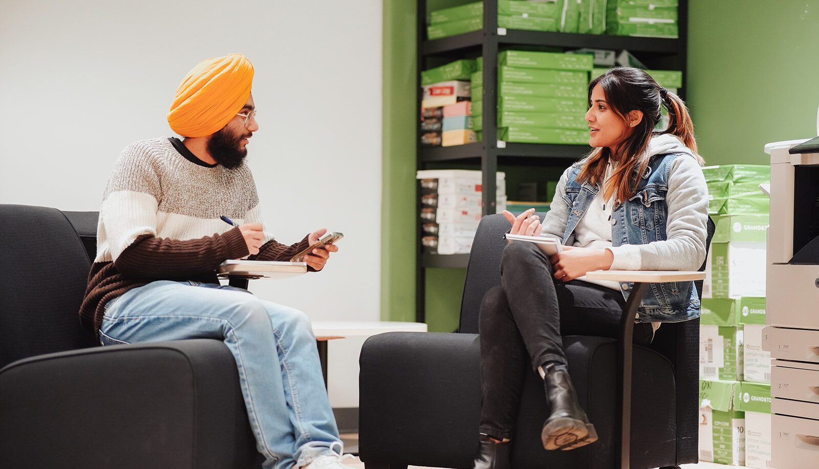 SUVCC Man Women Talking With Printer