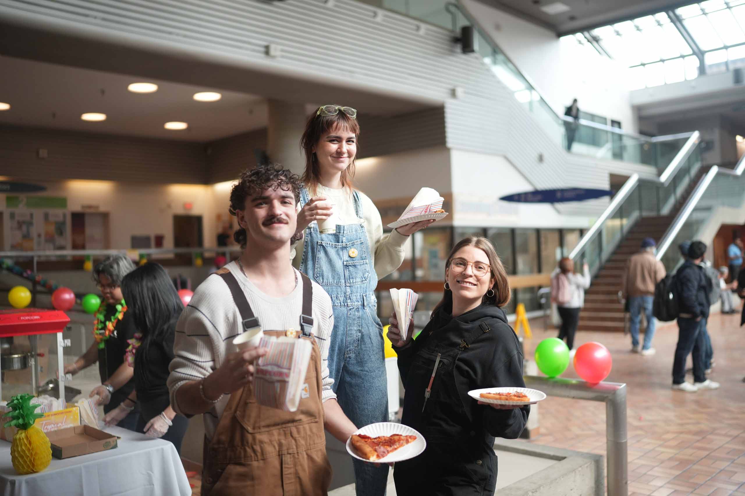 SUVCC Students Holding Pizza